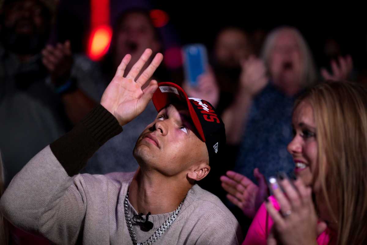 Desmond Ridder, former UC quarterback, reacts to being selected by the Atlanta Falcons in the third round of the 2022 NFL Draft at his draft party in Louisville, Ky., on Friday, April 29, 2022. Desmond Ridder Draft 46